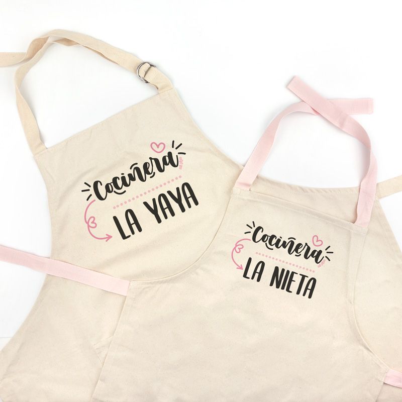 Pack Delantal Abuela y Delantal Nieto/a Rosa Diverrtido Cocinera la Abuela, cocinera la nieta